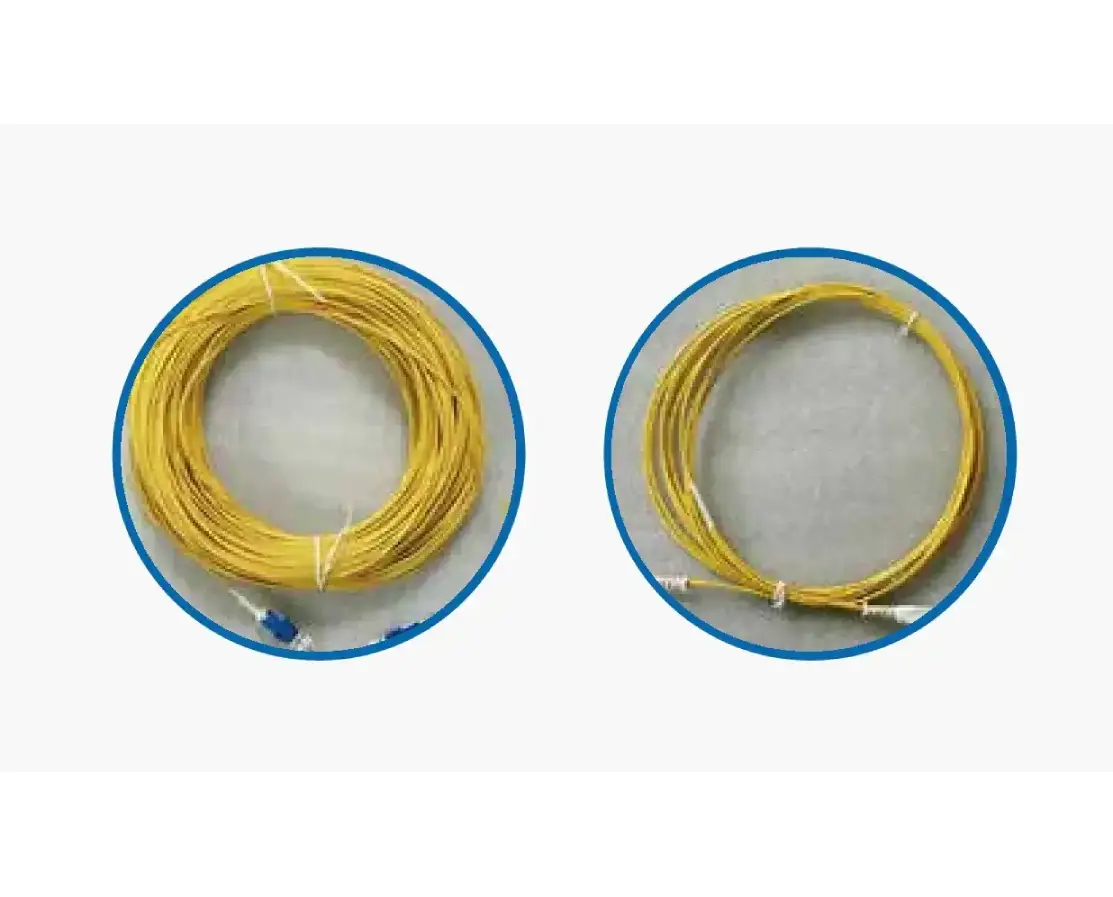 Coiled yellow fiber optic cables